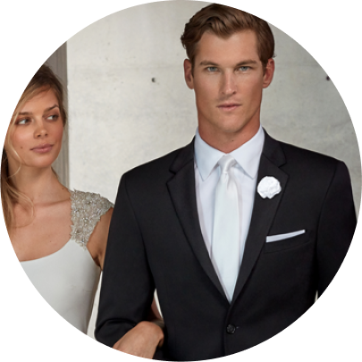 Groom-wearing-a-white-long-tie-black-tux-with-Bride Man wear a black tux with a long white bow tie, white pocket square with Bride